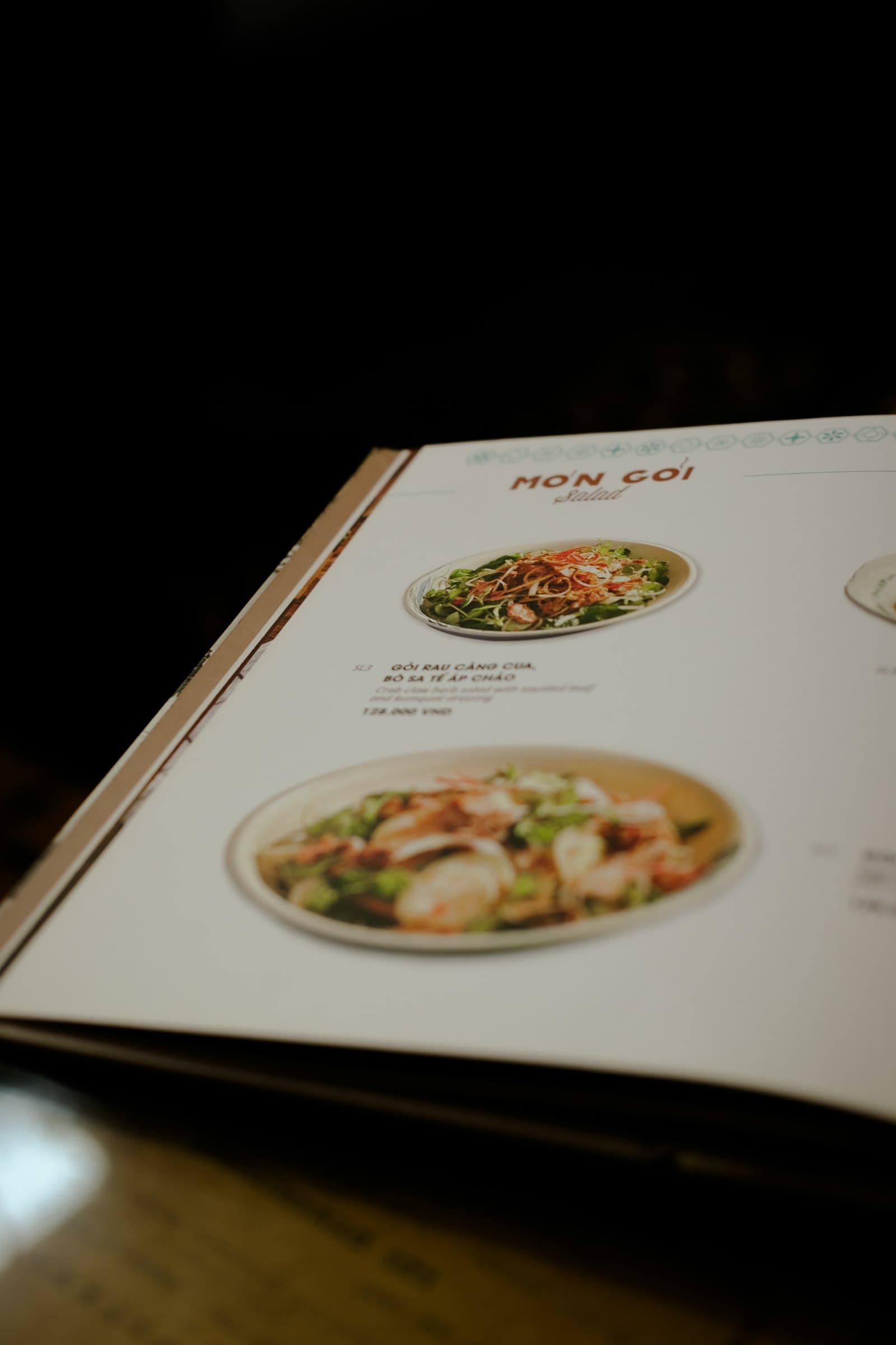 Open restaurant menu with dish photos and prices